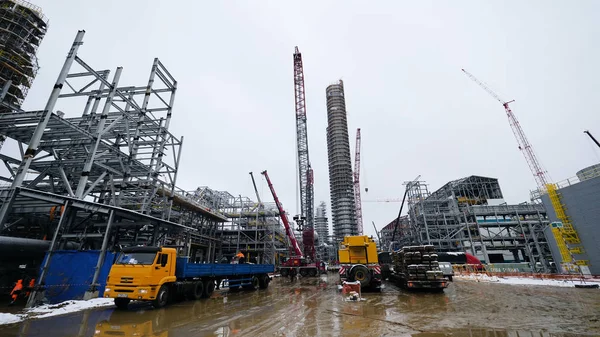 Metal construction of the future plant. Industrial zone,The equipment of oil refining,Close-up of industrial pipelines of an oil-refinery plant,Detail of oil pipeline with valves in large oil refinery