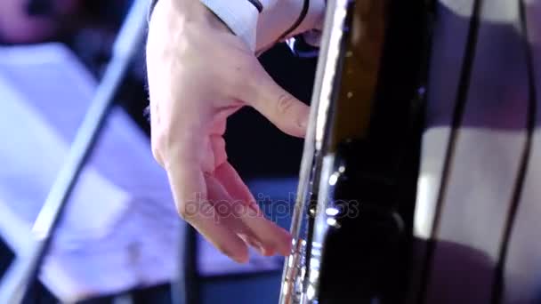 Masterful, masterly game on an electroguitar. Man plays a close up of a hand on an electroguitar — Stock Video