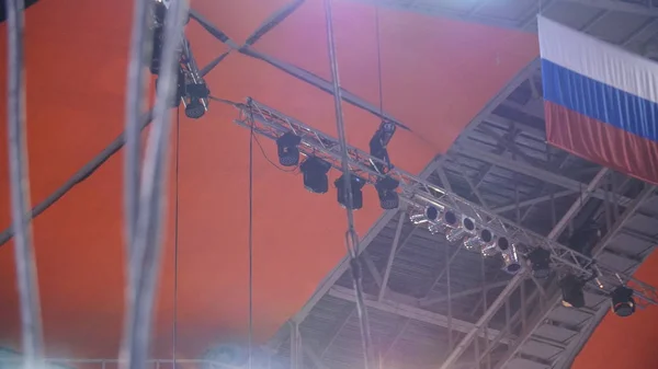 Stage lights. Soffits. Concert light. Illuminated concert stage without people, with light. Soffit on a tripod and a ramp with bright lights for show lighting — Stock Photo, Image