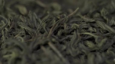 Çin siyah çay. Çay yaprakları arka plan kurumuş. Makro. Tatlı güzel kurutulmuş siyah çay yaprakları