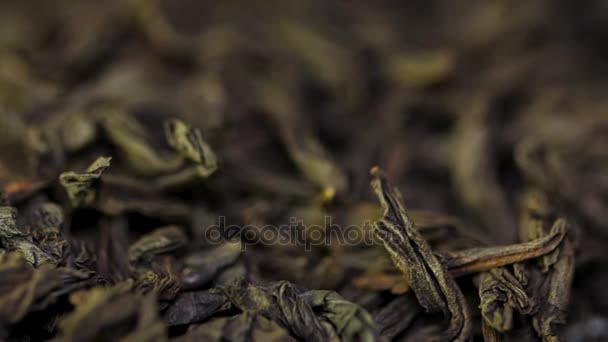 Chinese black tea. Dried tea leaves background. Macro. Beautiful dried black tea leaves closeup — Stock Video