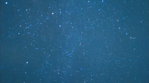 Beautiful night sky and stars with meteor or shooting star as background. Video. Animation of a starry sky with falling stars — Stock Photo, Image