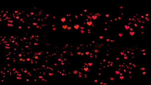 Pequeños corazones rojos volando sobre el fondo negro. Día de San Valentín vacaciones animación bucle abstracto. Animación de corazones sobre fondo negro — Vídeos de Stock