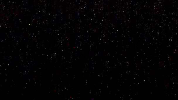 Animatie van kleur kralen op een zwarte achtergrond. De kleur animatie van dalende kruimels. Loop fotage — Stockvideo