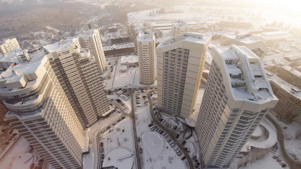 Complex of new apartment residential houses with balconies. Clip. Top view of the luxury residential complex at sunset