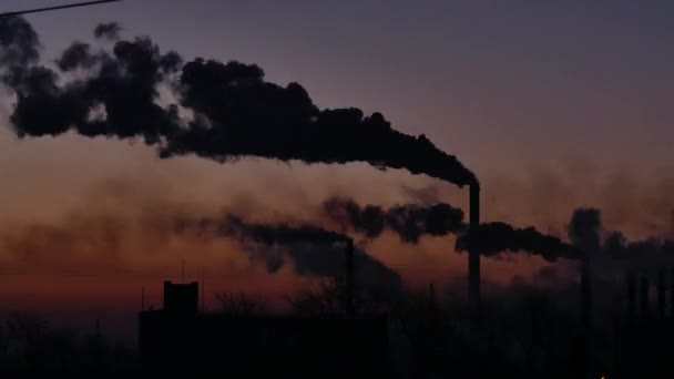 Smoking factory chimneys. Environmental problem of pollution of environment and air in large cities. View of large plant with Smoking pipes. Timelapse — Stock Video