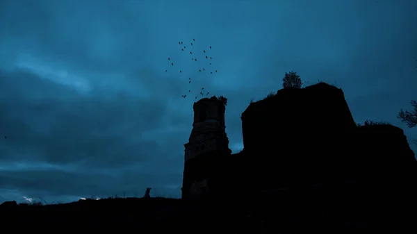 Mystical silhouette of a temple or castle against the cloudy sky and ravens flying in the sky at night. Video. The big old stone Castle on the Rock during the heavy storm and rain. Frightening church — Stock Photo, Image