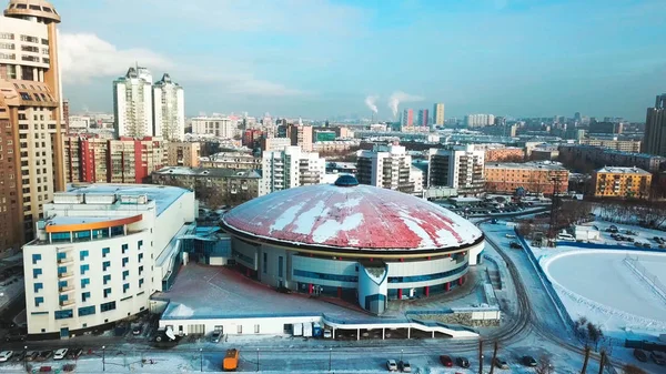 Cityscapes, high rise office buildings and skyscrapers in city, winter daylight, top view in winter. Top view of the modern winter city