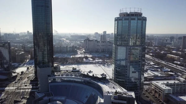 Business and commercial center Yekaterinburg City near local parliament buildings, hotels and Yeltsin Center. View from frozen river. View of Yekaterinburg-City district and north-western side of the