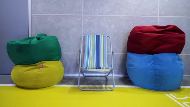 Place where ideas born. Colorful bean bags. Place for relaxation in the office — Stock Video