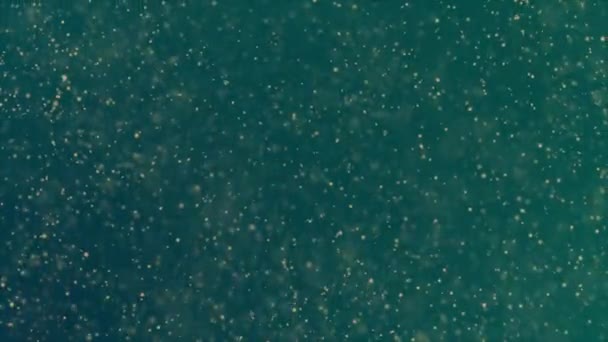 Points lumineux de lumière fond scintillant. Des points lumineux de lumière qui s'estompent, créant un fond abstrait surréaliste. Particules colorées flottant dans l'air 