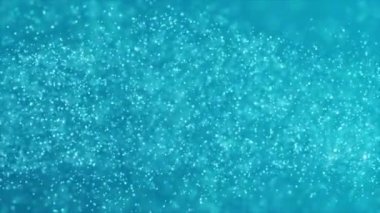 Işıltılı parçacıklar ışıltı ve boyunca kayması. Bokeh parlayan ile arka plan parıldıyor. Soyut altın bokeh parçacıklar. Puan alan animasyon