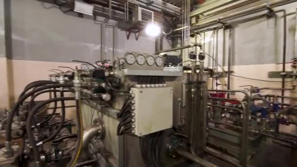 Pipelines, fittings, valves and pumps at the power plant. Stock footage. Different equipment at the compressor station at the factory. — Stock Footage Pipelines, fittings, valves and pumps at the power plant. Stock footage. Different equipment at the compressor station at the factory. Video Clip