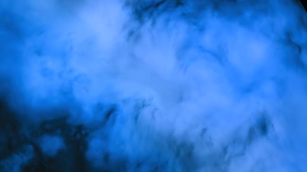 Animation of colored smoke on a black background. Animation. The smoke is rich, vivid color in the space — 비디오