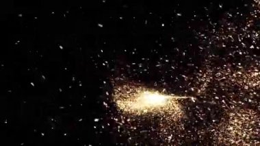 Siyah zemin üzerinde güzel altın uçan toz parçacıkları. Animasyon. Karanlıkta kaotik bir şekilde hareket eden parlak noktaların hızlı hareketi..