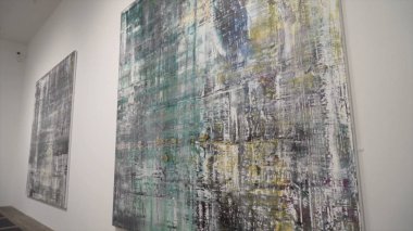 London, Britain-September, 2019: Painting at contemporary art exhibition. Action. Close-up of work of modern art-painting strokes from author Gerhard Richter clipart