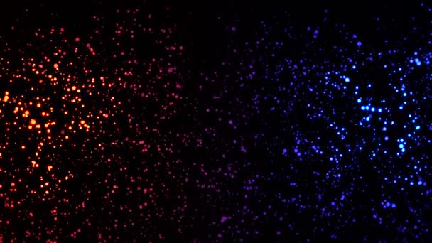 Neonově zbarvené tečky pohybující se vesmírem. Animace. Abstraktní animace pohybujících se barevných neonových teček na černém pozadí — Stock video