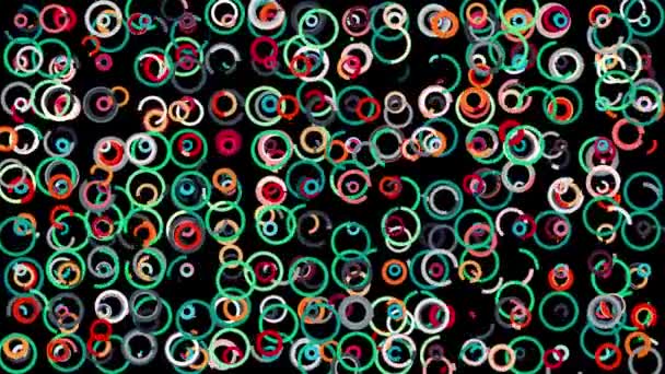Abstract moving narrow lines forming many circles swaying on black background, seamless loop. Animation. Colorful round figures, rings spread chaotically. — ストック動画