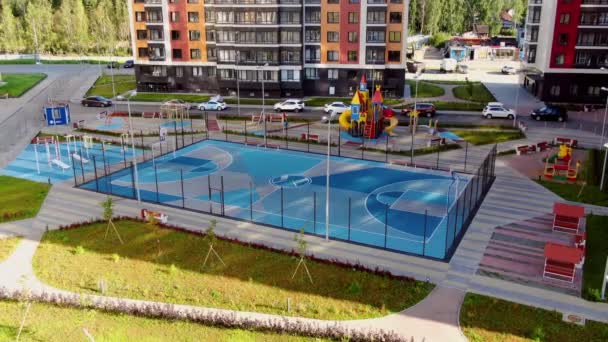 Top view of beautiful modern Playground at residential complex. Motion. Design landscape of modern Playground with different colors and purposes — Stock Video