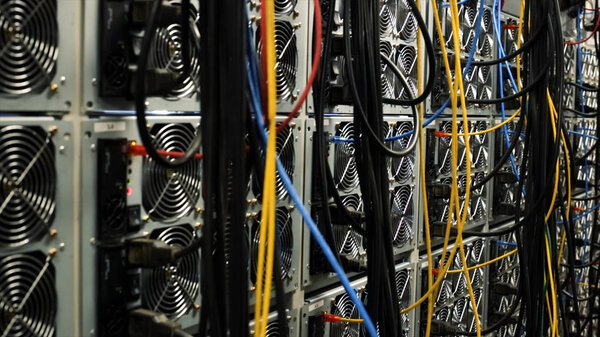 Inside room with data centers and cables. Stock footage. Room with data centers, cables and solar panels to absorb bright artificial lighting