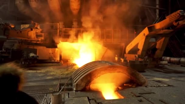 Close up view of working blast furnace at the metallurgical plant, heavy industry concept. Stock footage. Industrial landscape inside the hot shop for melting metal. — 비디오