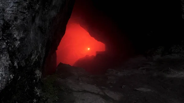 Silueta de hombre en una cripta subterránea abandonada con llamarada de señal roja ardiente. Imágenes de archivo. Hombre en cuclillas frente a un agujero de cueva en completa oscuridad . — Foto de Stock