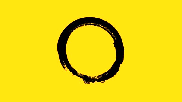 Abstract animation of drawing a circle with a brush. Animation. Circle drawn in black ink on a yellow background — Stock Video