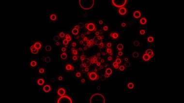 Soyut kırmızı halkalar, siyah zemin üzerinde kameraya doğru yavaşça akıyor, kusursuz bir döngü. Animasyon. Renkli daireler hareket ediyor ve yaklaşıyor.