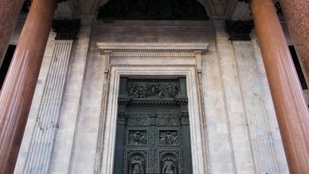 Facade of great gate to Cathedral. Concept. Beautiful high gates at entrance to historical architectural temple. Majestic black gate with patterns at entrance to european historical building of — Wideo stockowe