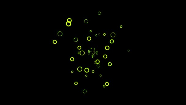 Animasi abstrak dari cincin hijau kecil berwarna-warni mengambang di latar belakang hitam. Animasi. Lingkaran bingkai semakin dekat ke kamera . — Stok Video