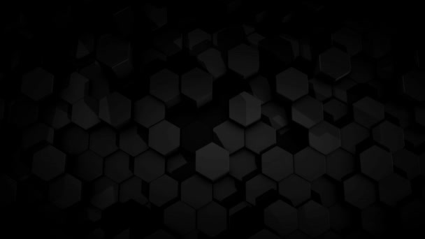 Abstrakt futuristisk hexagon glödande nand flytta svart yta, struktur, sömlös loop. Animering. Enfärgade 3D-figurer rör sig kaotiskt. — Stockvideo