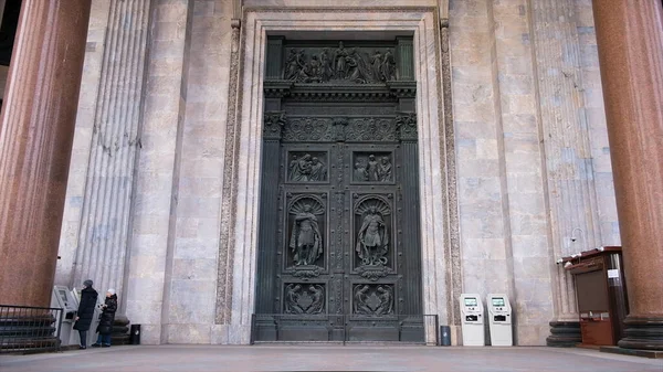 Facade of great gate to Cathedral. Concept. Beautiful high gates at entrance to historical architectural temple. Majestic black gate with patterns at entrance to european historical building of — Stockfoto