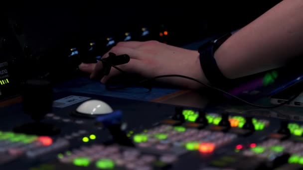 Close up of lit lights of different buttons on the control panel and the controller male hand. Stock footage. Manufacturing machinery and engineering concept. — Stock Video
