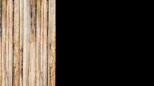 Background of vertical wooden boards appear on black background. Animation. Concept of construction of natural materials, moving parallel wooden planks. — Stock Video