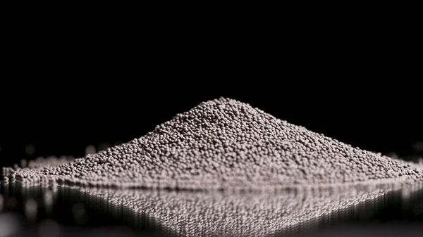 Heap of black pepper grains isolated on black background. Stock footage. Cuisine and cooking concept, dried small round grains of black peppercorns spice.