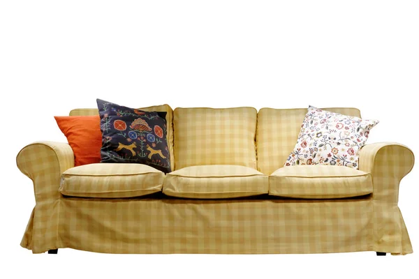 Sofá cubierto de tela de color marrón claro celda con almohadas en ella —  Fotos de Stock