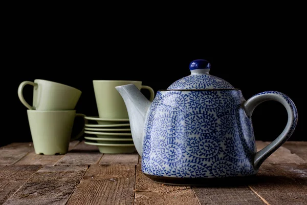 Café en una taza con un postre dulce —  Fotos de Stock