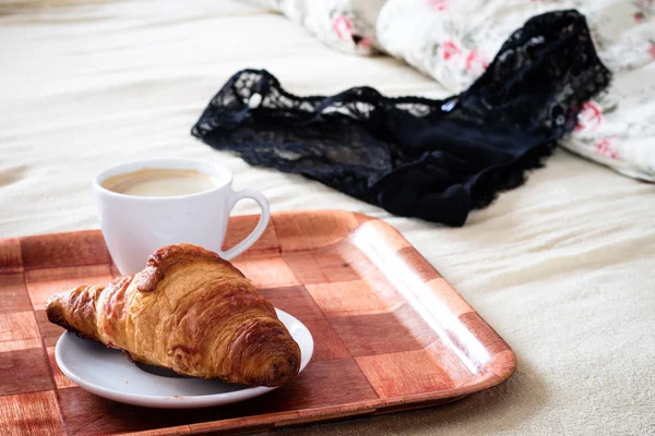 Morning, tasty breakfast to bed. Lingerie, bras and coffee. — Stock Photo, Image