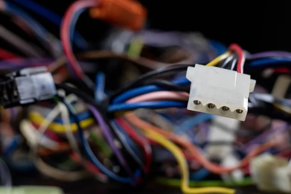 Old entangled cables, electronics and old cable connectors on a — Stock Photo, Image