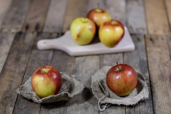 Big red apples in a dark wooden box. Wooden crate and apples on — Stock Photo, Image