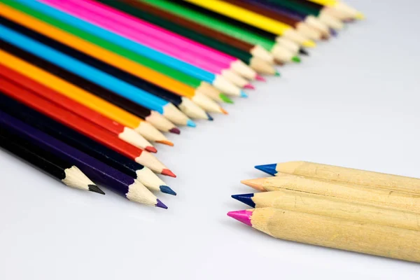 Colored pencil crayons on white isolated ground. School accessor — Stock Photo, Image