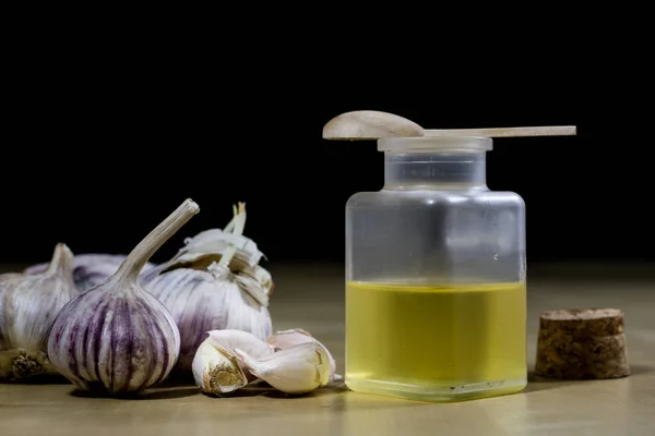 Garlic the best specific for influenza. Syrup prepared from heal — Stock Image Garlic the best specific for influenza. Syrup prepared from heal Stock Photo