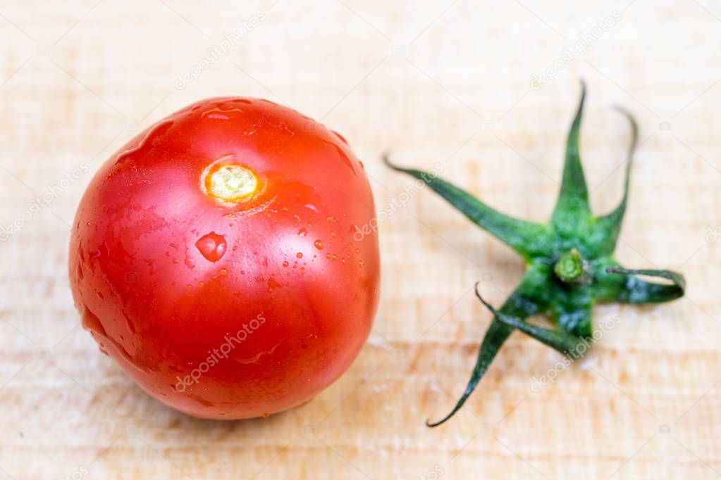 Tasty and ripe cherry tomatoes with droplets of water. Washed ve