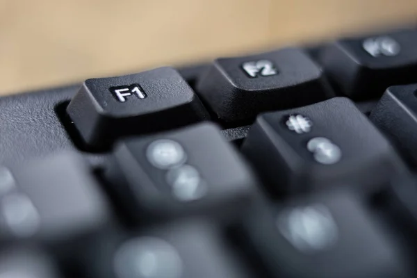 Un clavier d'ordinateur agrandi. Touches clavier noir pour le co — Photo