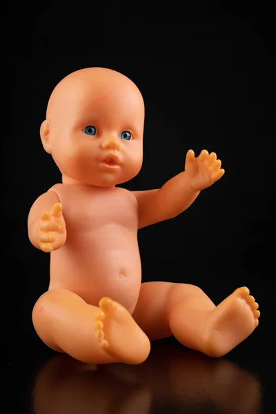 Children's plastic doll on the table. Old toys for children. — Stock Photo, Image