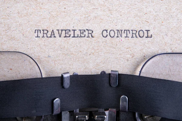 The words traveler control written in typewriter font. The inscr — Stock Photo, Image