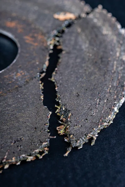 Damaged cutting disc for metal in an angle grinder. Power tools — 스톡 사진