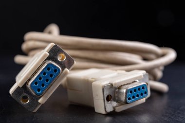 Old computer cable for transferring digital data. Computer acces