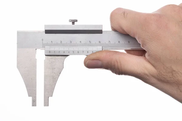 男の手に持っていたキャリパー ロックスミスの測定器 — ストック写真