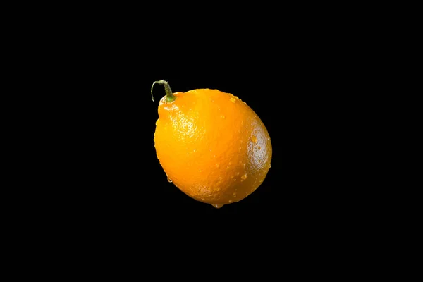 Wet lemon on black background — Stock Photo, Image